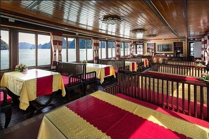 Halong bay 4 hours boat tour from Halong city with 2 caves, kayak - Thien Cung Cave and its 400-meter walking route