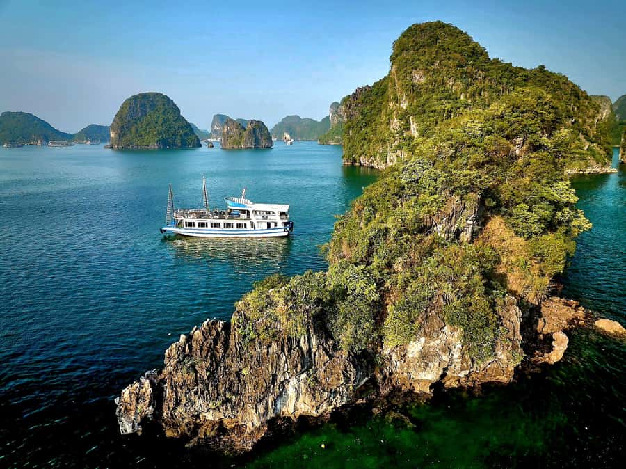 Halong Bay: Day Cruise with Caves, Kayaking & Sunset Party - Boarding at Tuan Chau Harbor around noon