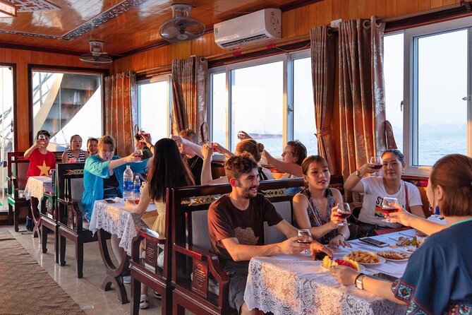 Halong Bay Day Tour With Titop Island, Cave, Kayak & Lunch - Titop Island for a climb or a swim