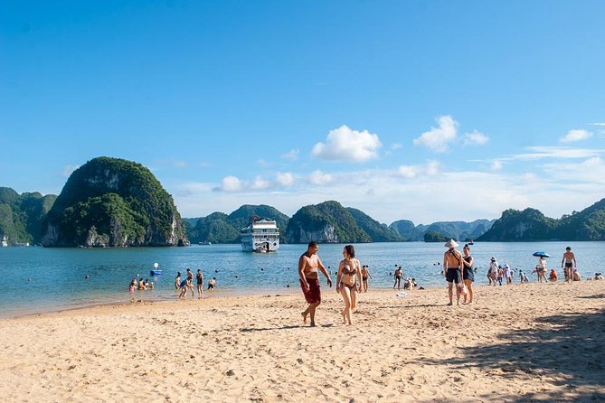 Halong Bay Day Tour With Titop Island, Cave, Kayak & Lunch - Crowds, pacing, and the real feel of Halong Bay
