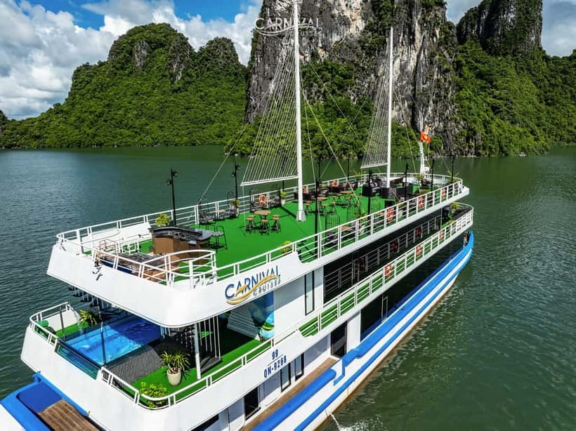 Halong Bay: Luxury Day Cruise w/ Pool, Kayak, Free Transfer - Kayaking or bamboo boat through Luon Cave