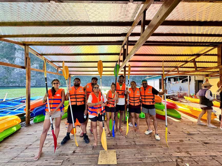 Halong Bay: Luxury Day Cruise w/ Pool, Kayak, Free Transfer - Titop Island, swimming, and the climb