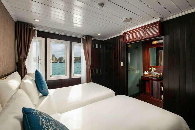 Hanoi: 2-Day Halong Bay Boutique Cruise with Kayaking - Sunset, cooking, and a lively first night
