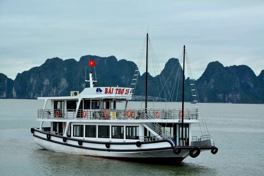 Hanoi: Roundtrip Halong Bay Islands, Caves, Kayaking & Lunch - Boarding at Tuan Chau around noon