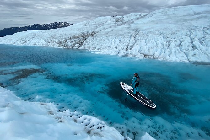 Helicopter and Glacier Paddle Boarding -PRIVATE - Swimming, floating, and exploring the ice