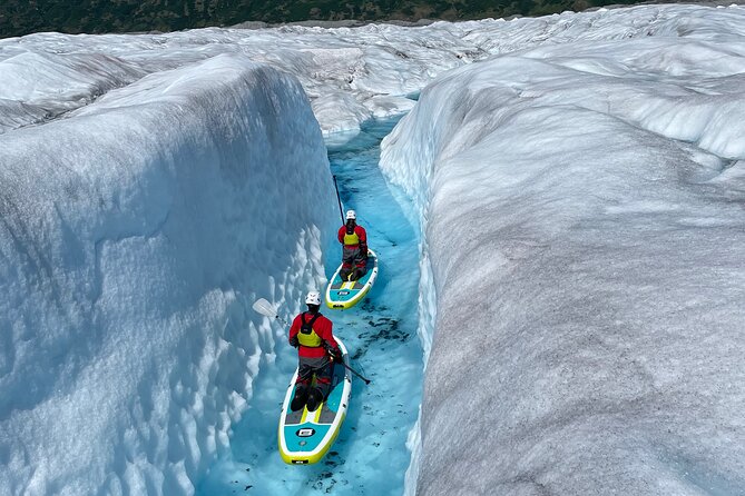 Helicopter and Glacier Paddle Boarding -PRIVATE - Landing on the glacier and getting your footing
