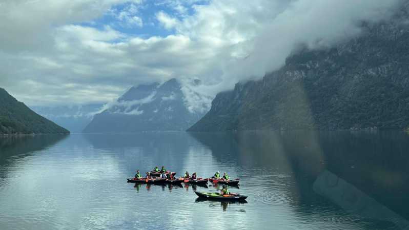 Hellesylt: Beginner-Friendly Fjord Kayaking Experience - Following the fjord shore beneath the waterfalls