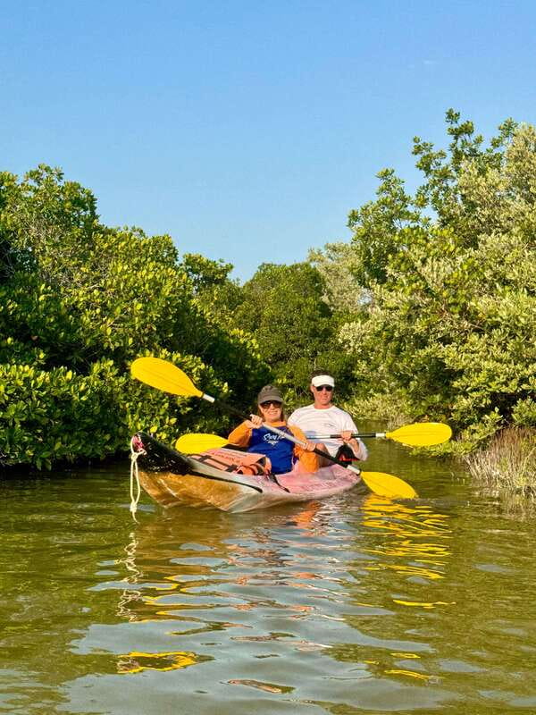 Holbox: Mangrove Sunset Kayak Tour - Sunset over a quiet river