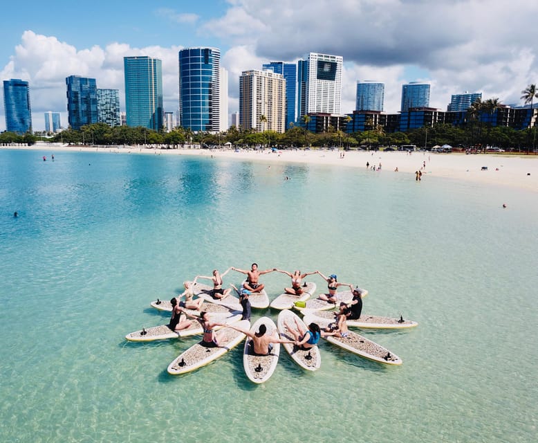 Honolulu: SUP (Standup Paddleboard) Yoga Class - Starting at Magic Island with a paddleboard
