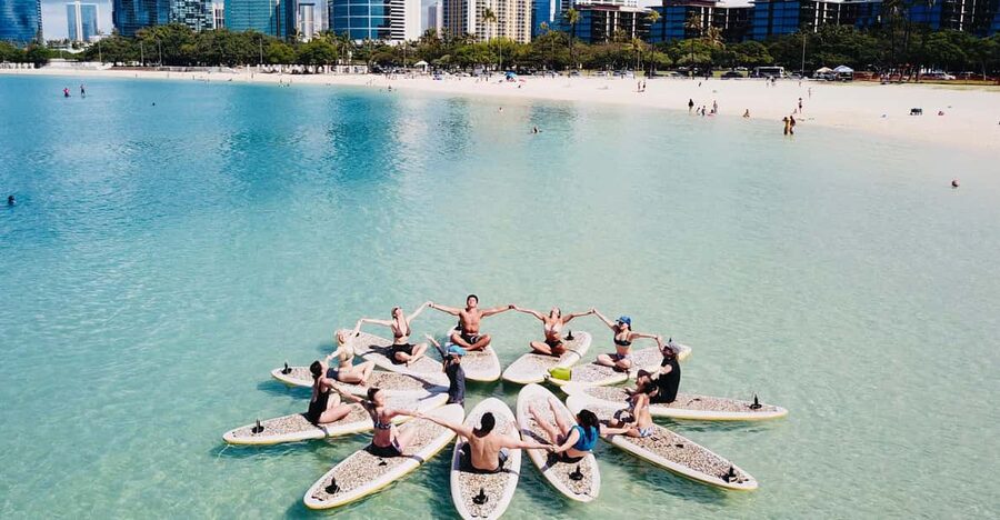 Honolulu: SUP (Standup Paddleboard) Yoga Class - Familiar poses with a floating floor