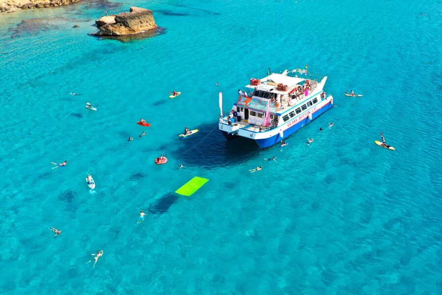 Ibiza: Beach Hopping Cruise w/ Paddleboard, Food, & Drinks - Cala Tarida and the open water
