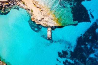 Beach Hopping Cruise w/ Paddleboard, Food, & Drinks