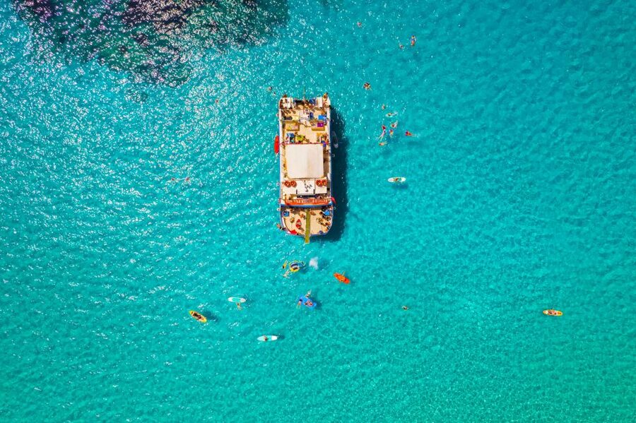 Ibiza: Beach Hopping Cruise w/ Paddleboard, Food, & Drinks - What the boat atmosphere is really like