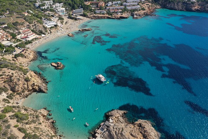 Ibiza Beach Hopping Cruise with Paddleboards, Drinks and Food 6h - The open-water stop is the active center of the day