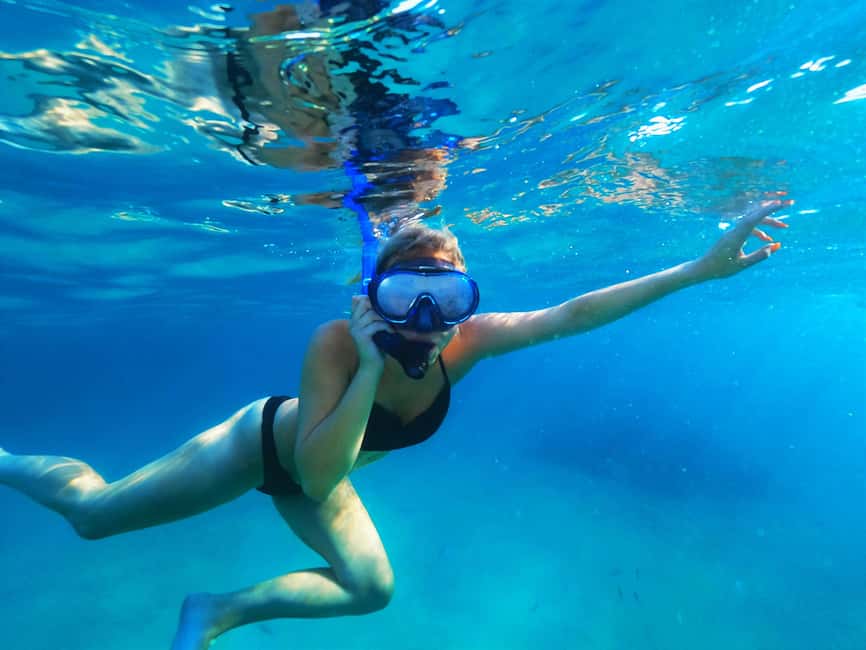 Ibiza: Snorkeling and SUP Paddle, Beach and Cave Tour - Cala Conta: shallower water and an easier swim