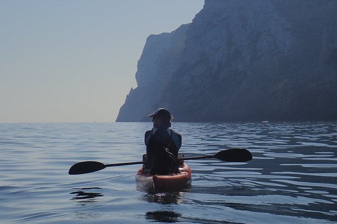 Kayak and snorkel excursion to Cova Tallada - Inside the cave with a lantern