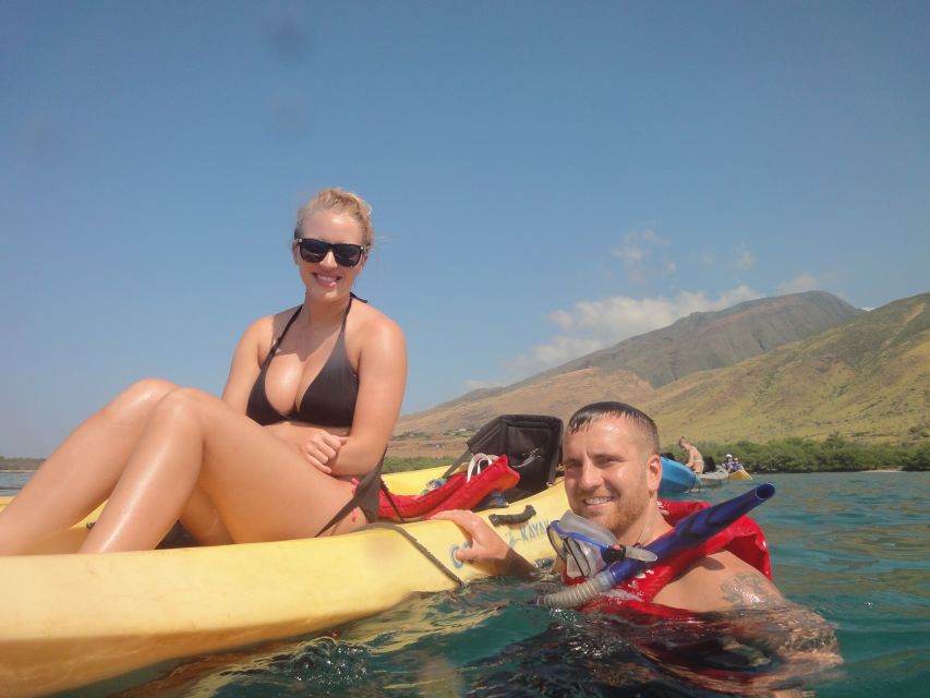 Kayak and Snorkel West Maui at Olowalu - Listening to whales through the hydrophone
