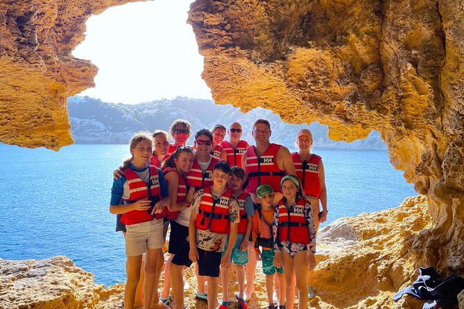 Kayak Paradise: Cala Portixol Snorkel, Cave & Cliff Jumping Tour - Looking up at Cap Negre