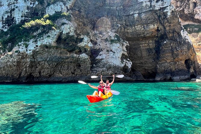 Kayak Paradise: Cala Portixol Snorkel, Cave & Cliff Jumping Tour - Paddling toward Cala el Pom