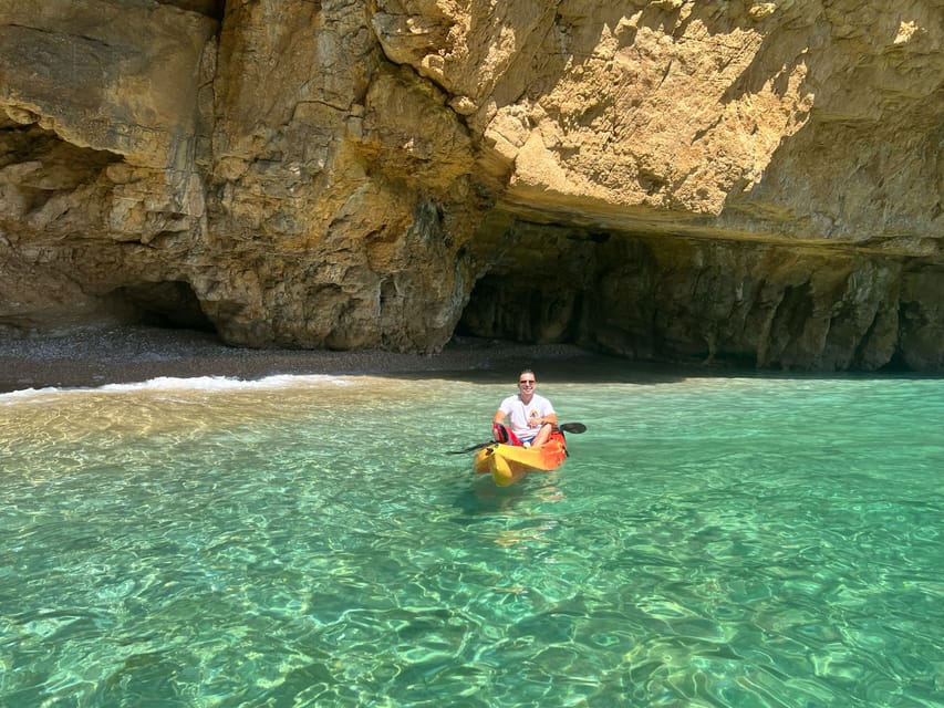 kayak route in granadella javea cave llop marí,cala en caló - Paddling toward Llop Marí Cave