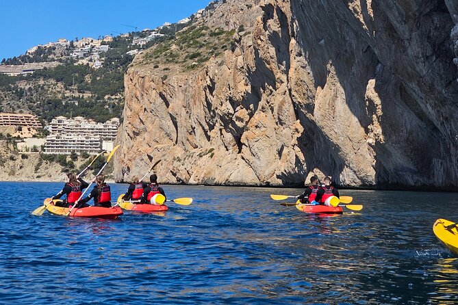 Kayak through Morro de Toix and Cueva dels Coloms - Entering Cueva dels Coloms with helmet and headlamp