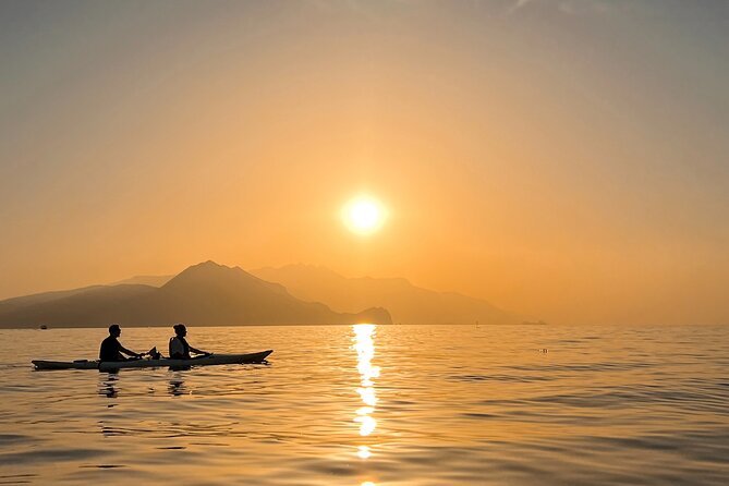 Kayak tour in Capri between caves and beaches. Photos included. - A swim stop in Capri’s clear water