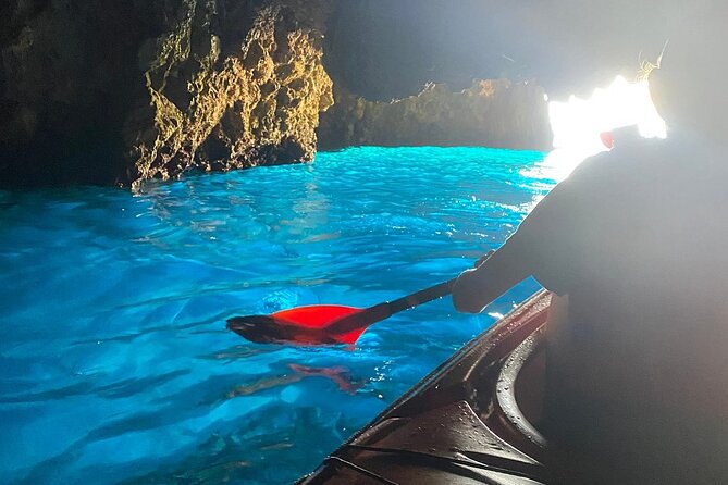 Kayak Trip to Hidden blue Cave, with lunch & fruits. - Entering the Hidden Blue Cave