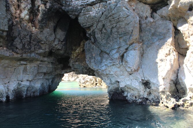Kayaking along the Algarve Coast - Limestone cliffs, caves, and seabirds