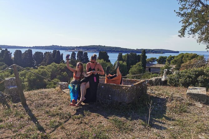 Kayaking to Island Saint Jerolim with snorkeling activitie - Walking the island, meeting peacocks, and seeing odd creations
