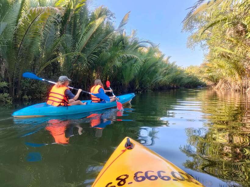 Kayaking tour around green cathedral - Swimming, fruit, beer, and the last light