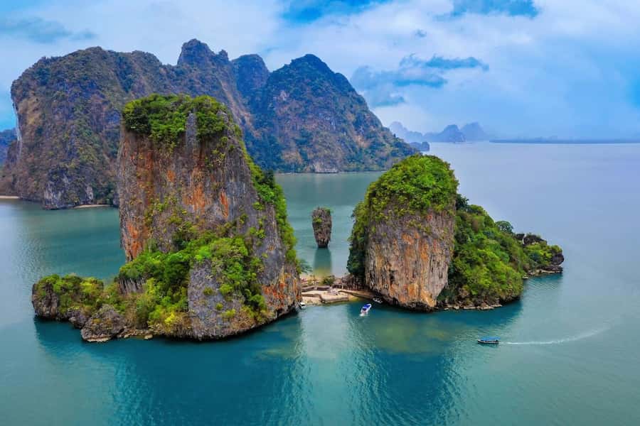 Khao Lak: Twilight Sea Canoe and Glowing Plankton Tour - Panak Island and its secret rooms