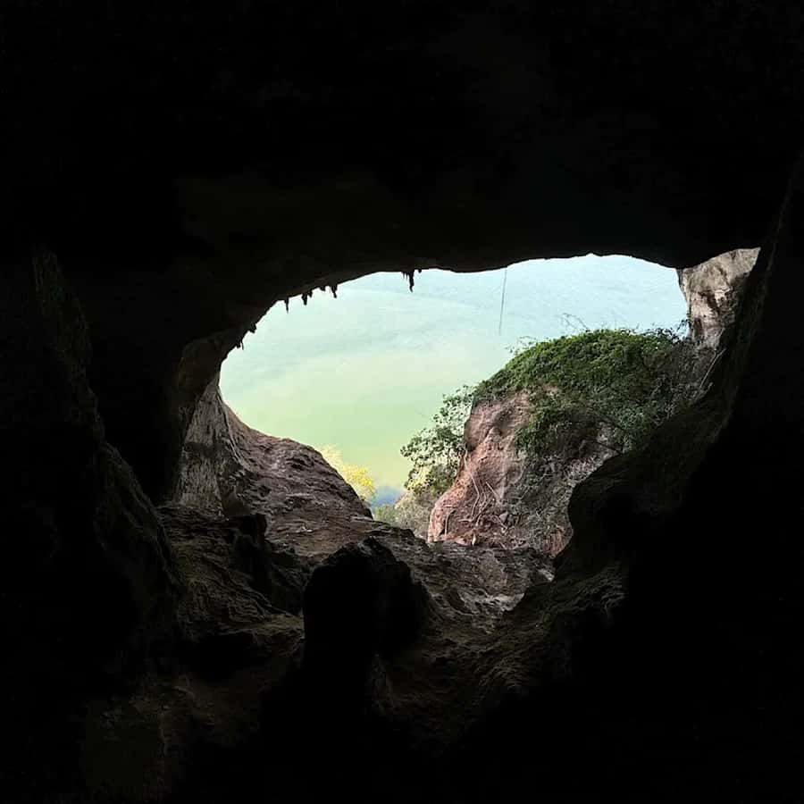 Ko Lanta: Half-Day Kayaking Koh Phee & Koh Talabeng 2 Caves - Climbing into Koh Phee’s cave