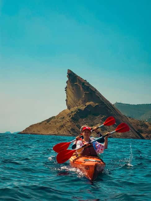 La Ciotat: Calanques National Park Guided Kayak Tour - Small caves, swimming, and photographs