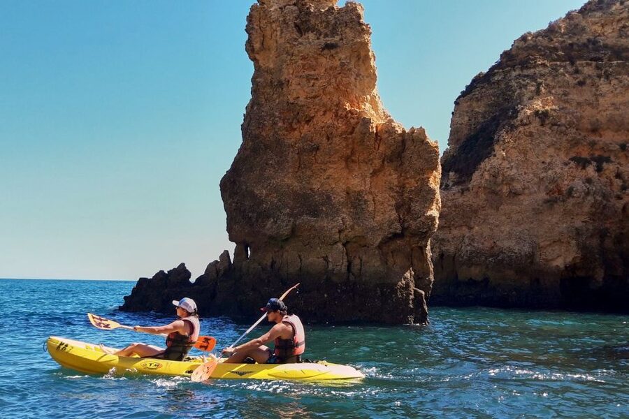 Lagos: Guided Kayak Tour - Paddling from the beach toward Ponta da Piedade