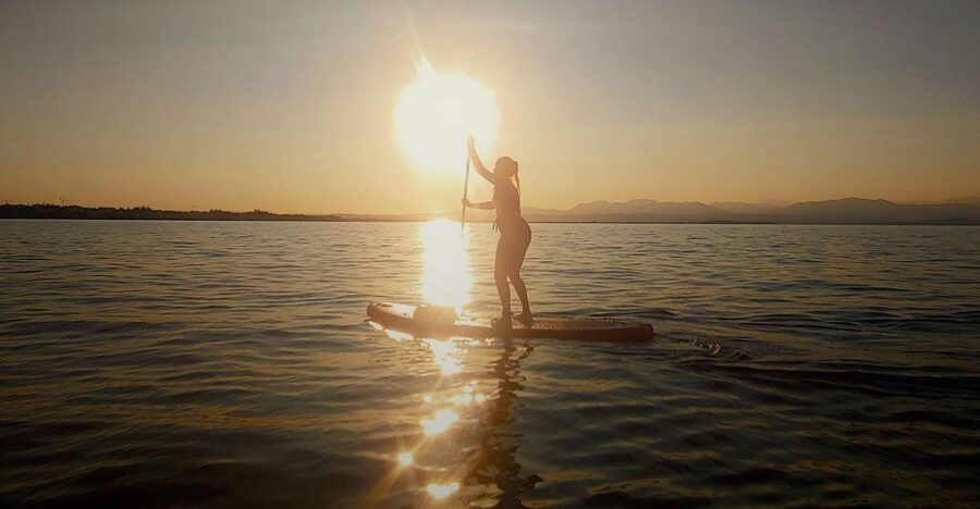 Lake Garda: Stand-Up Paddleboard Sunset Experience - What the 90-minute route feels like