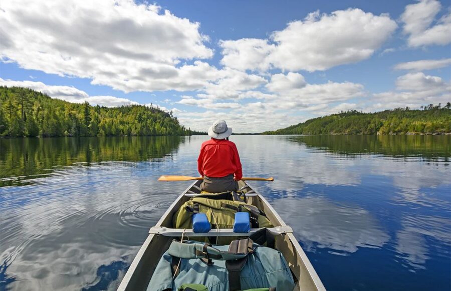 Lapland: Canoeing Trip with Reindeer and Husky Farm Tour - Canoeing through forest to a quiet lake