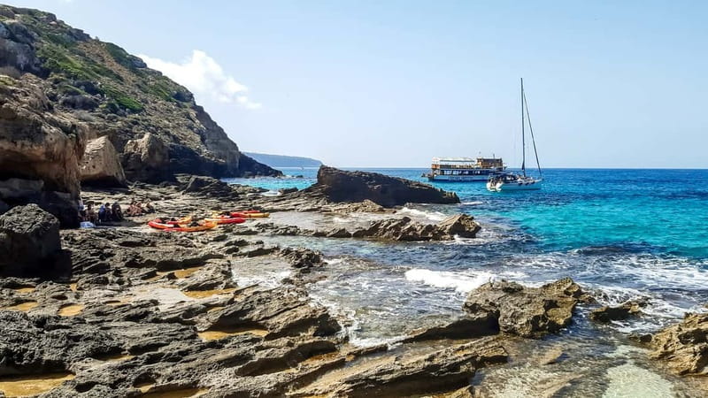 Mallorca: Sea Caves Kayaking Tour, Snorkeling & Snack - Guides, safety, and the support boat