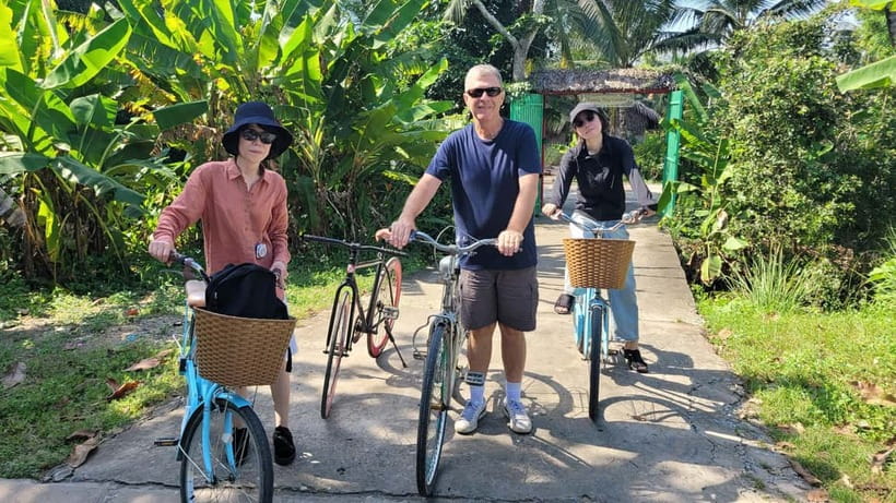 Mekong Delta Nature Private Day Trip: Bicycle-Kayak-Cano... - Cycling through rice fields to Xom Trau Pagoda