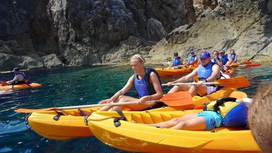 Menorca: Kayak and Marine Reserve Snorkeling Adventure - Paddling past La Mola de Fornells