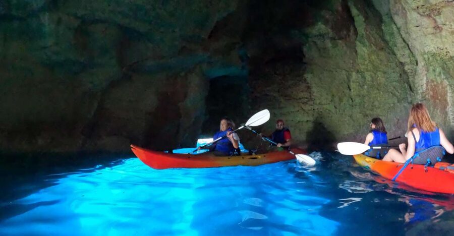 MENORCA: Kayak cave route + photo session. - Paddling toward Cova d’en Xoroi