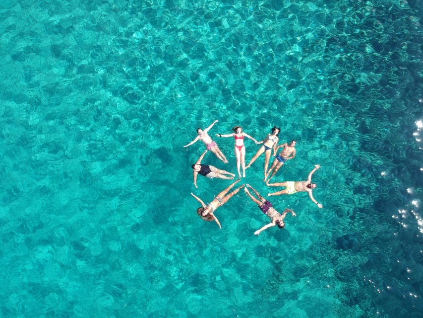 Milos: Full-Day Catamaran Cruise with Paddle Board - Kleftiko: caves, arches, swimming, and lunch