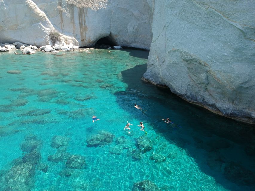 Milos: Full-Day Catamaran Cruise with Paddle Board - Adamas to Klima: a scenic start with plenty of stories