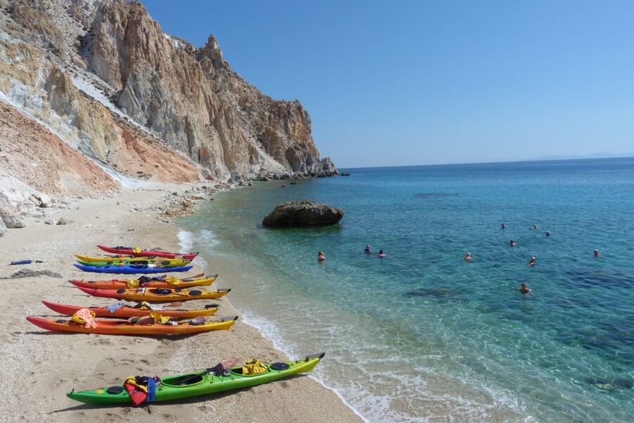 Milos: Guided Kayaking Trip with Snorkelling & Lunch - The first beach stop: swimming, snorkelling, and snacks