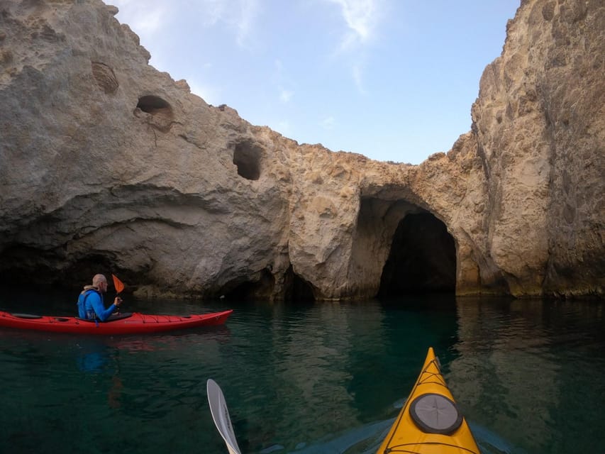 Milos: Romantic Semi Private Sunset Kayaking Tours - Inside the caves and beside the rock walls