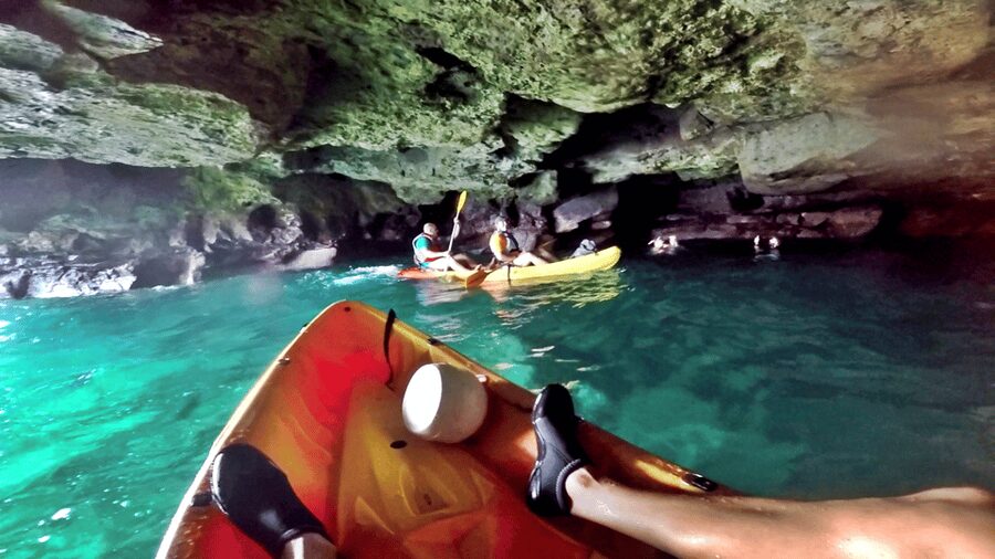 Mogán: Guided Kayak to Caves and Snorkeling Tour - Cliff jumps with three height choices