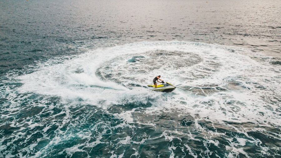 Mykonos: Super Paradise Beach Jet Ski, Canoe, & SUP Rental - Seeing Super Paradise Bay from the sea