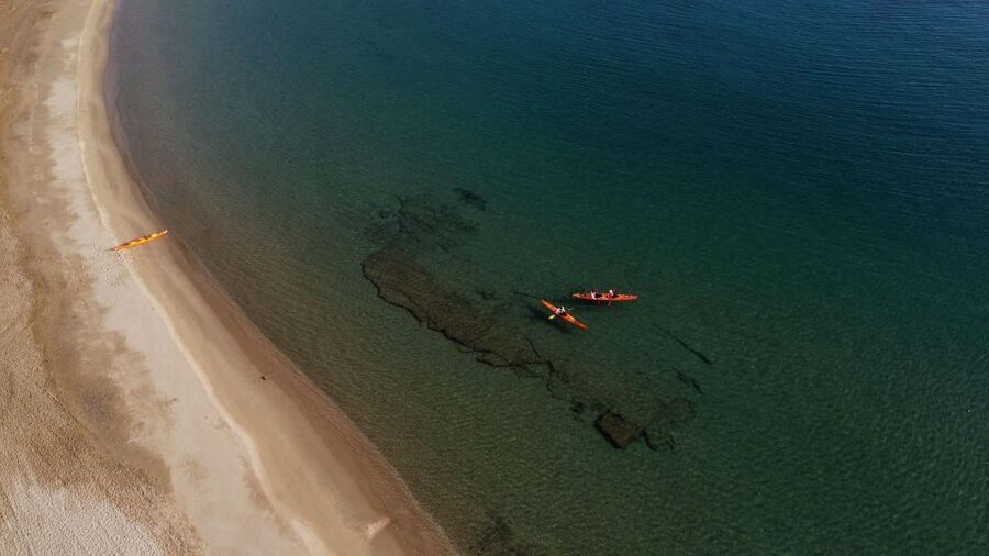 Naxos: Rhina Cave and Coastline Sea Kayaking Tour - Snacks, history, and the optional taverna meal