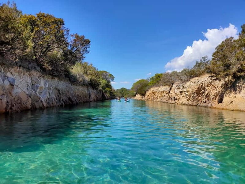 Orosei: Guided Kayak Tour of the Biderosa Oasis at Sunset - Paddling the Canal toward Biderosa