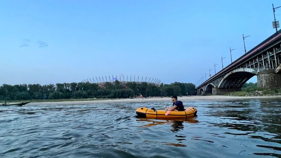 Packrafting kayaking guided tour Vistula river Warsaw Poland - Island pauses, photographs, and the Old Town at sunset