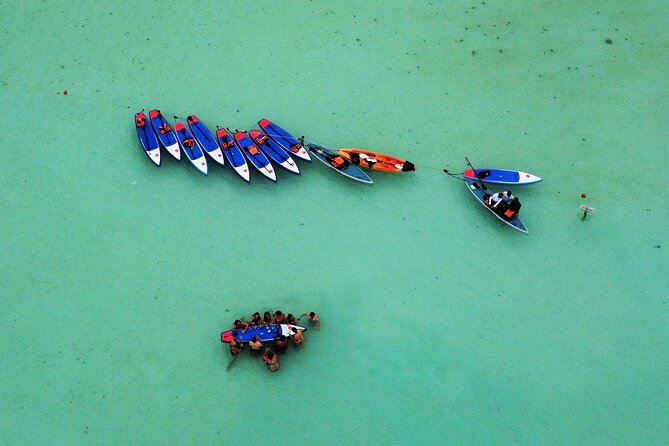 Paddle at Dawn with visit to Cenotes and Islands - Getting set up for a kayak or paddleboard